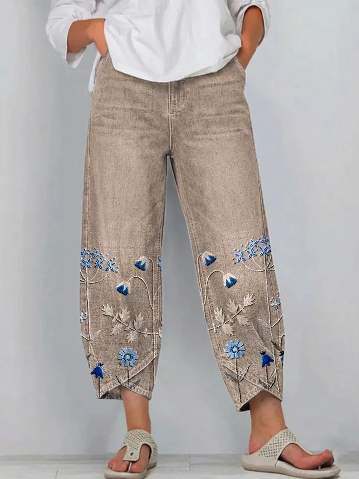 Dames cropped broek met bloemenborduursel en gesplitte zoom
