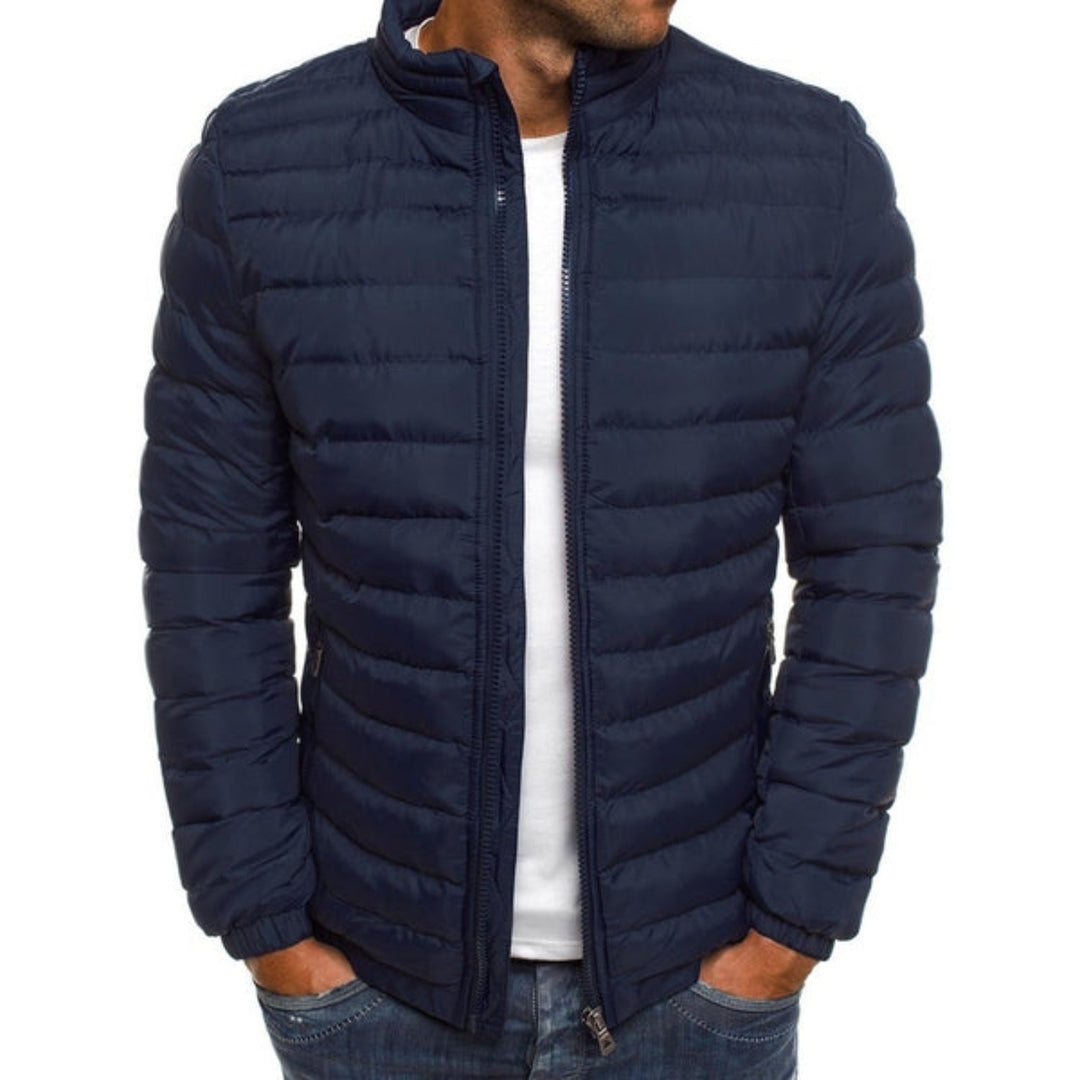Donkerblauw gewatteerd herenjack met opstaande kraag