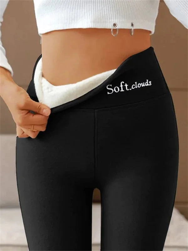 Zwarte legging met zichtbare witte fleecevoering