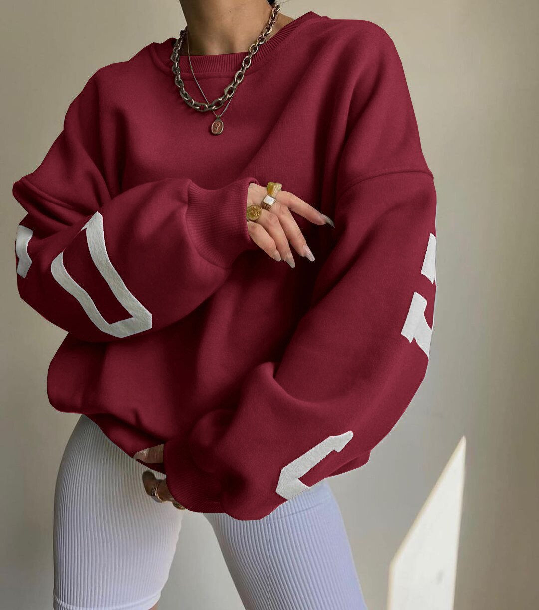 Oversized damestrui met letterprint Ronde hals