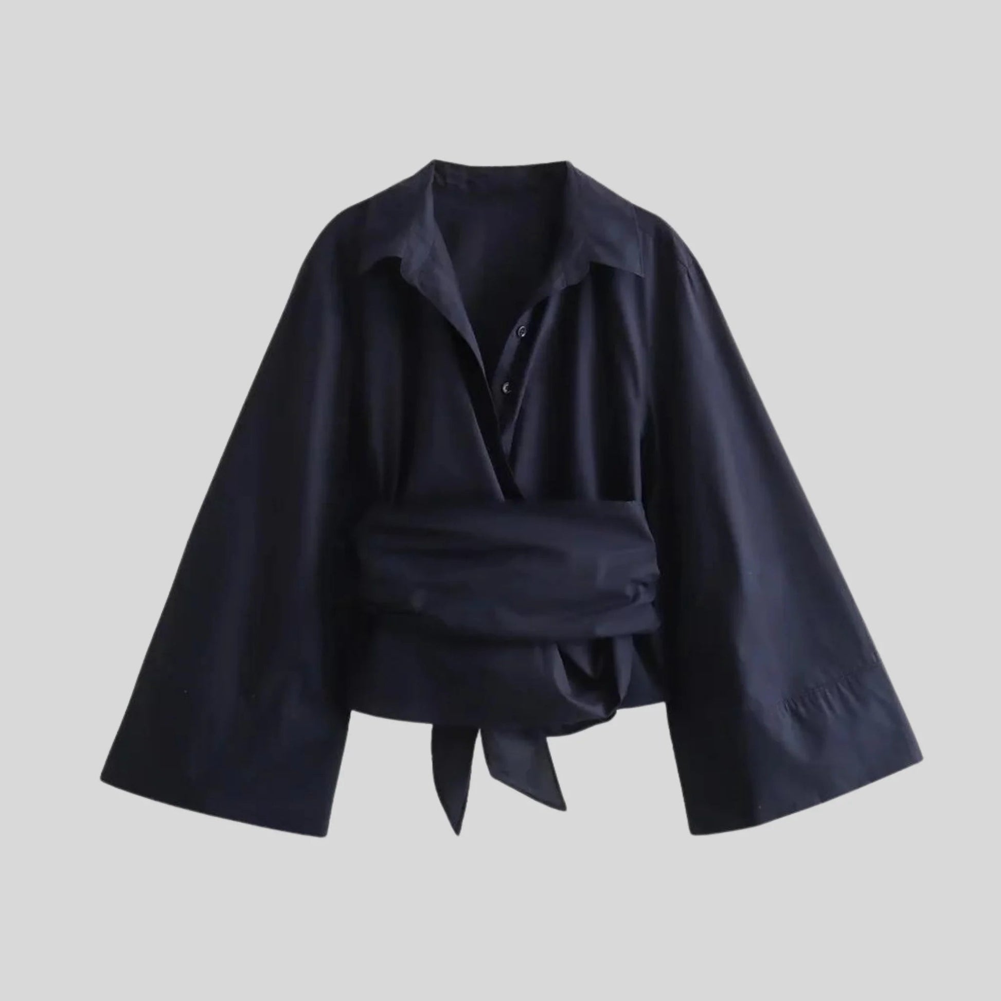 Damesblouse met wikkeldetails wijde mouwen en strikceintuur Modehuis-Nederland