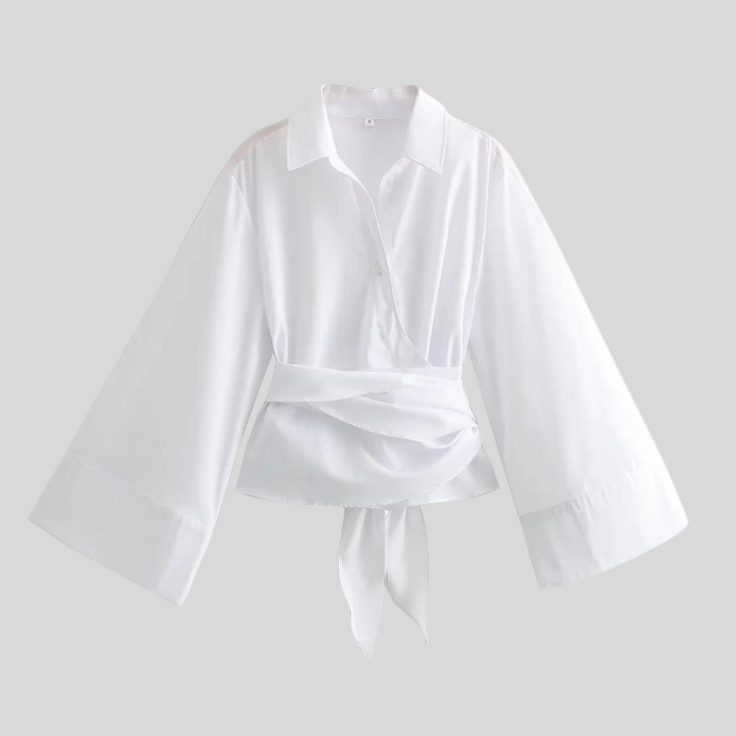 Damesblouse met wikkeldetails wijde mouwen en strikceintuur