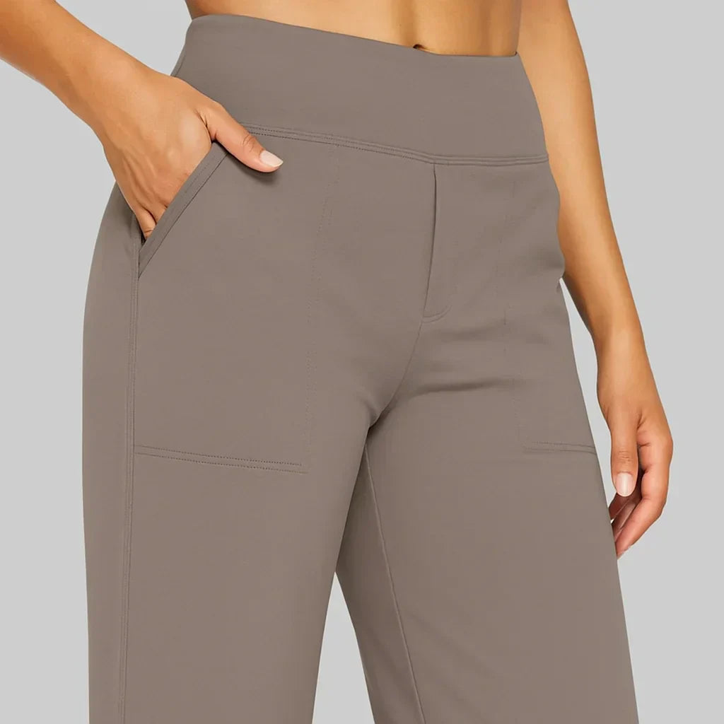 Damesbroek met wijde pijpen hoge taille en zakken