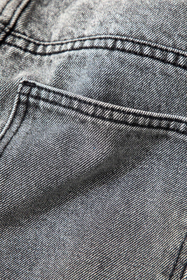 Damesjeans met wijde pijpen en gekruiste bandjes