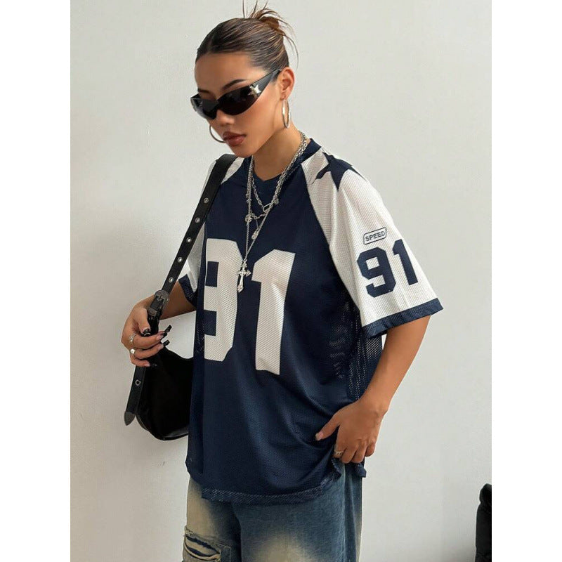 Dames oversized jersey shirt marineblauw zijaanzicht met nummer op de mouw