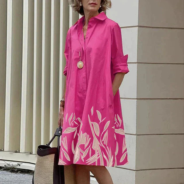 Dames blousejurk met overhemdkraag in Roze met print aan de zoom
