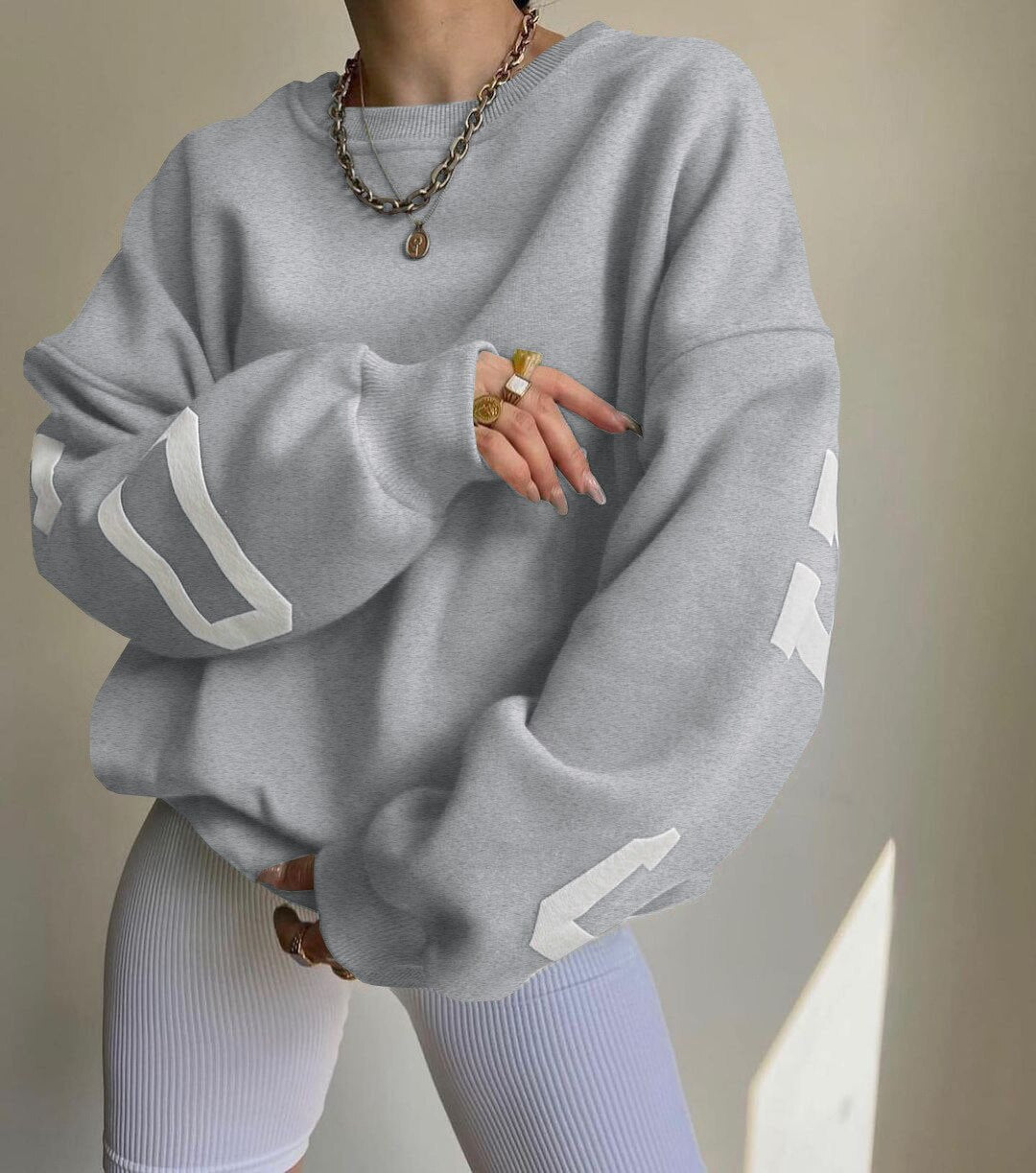Oversized damestrui met letterprint Ronde hals