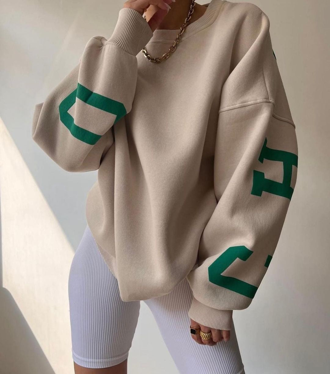 Oversized damestrui met letterprint Ronde hals