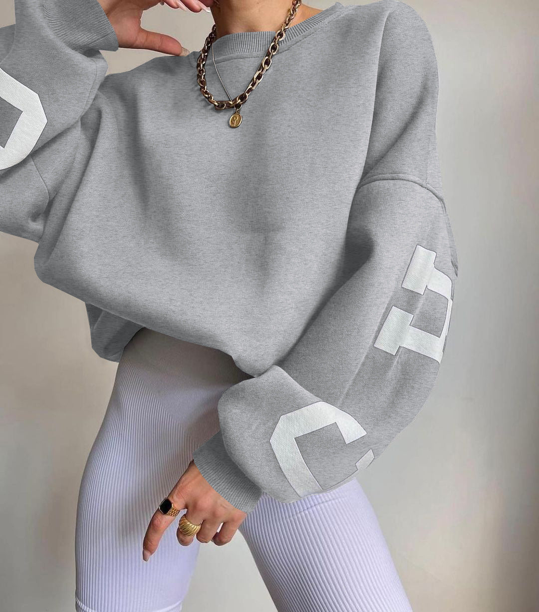 Oversized damestrui met letterprint Ronde hals