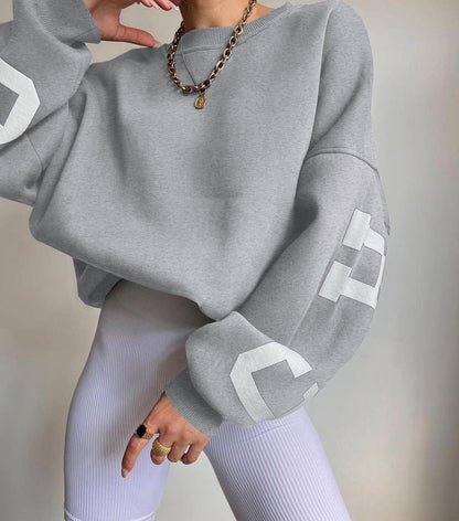 Oversized damestrui met letterprint Ronde hals