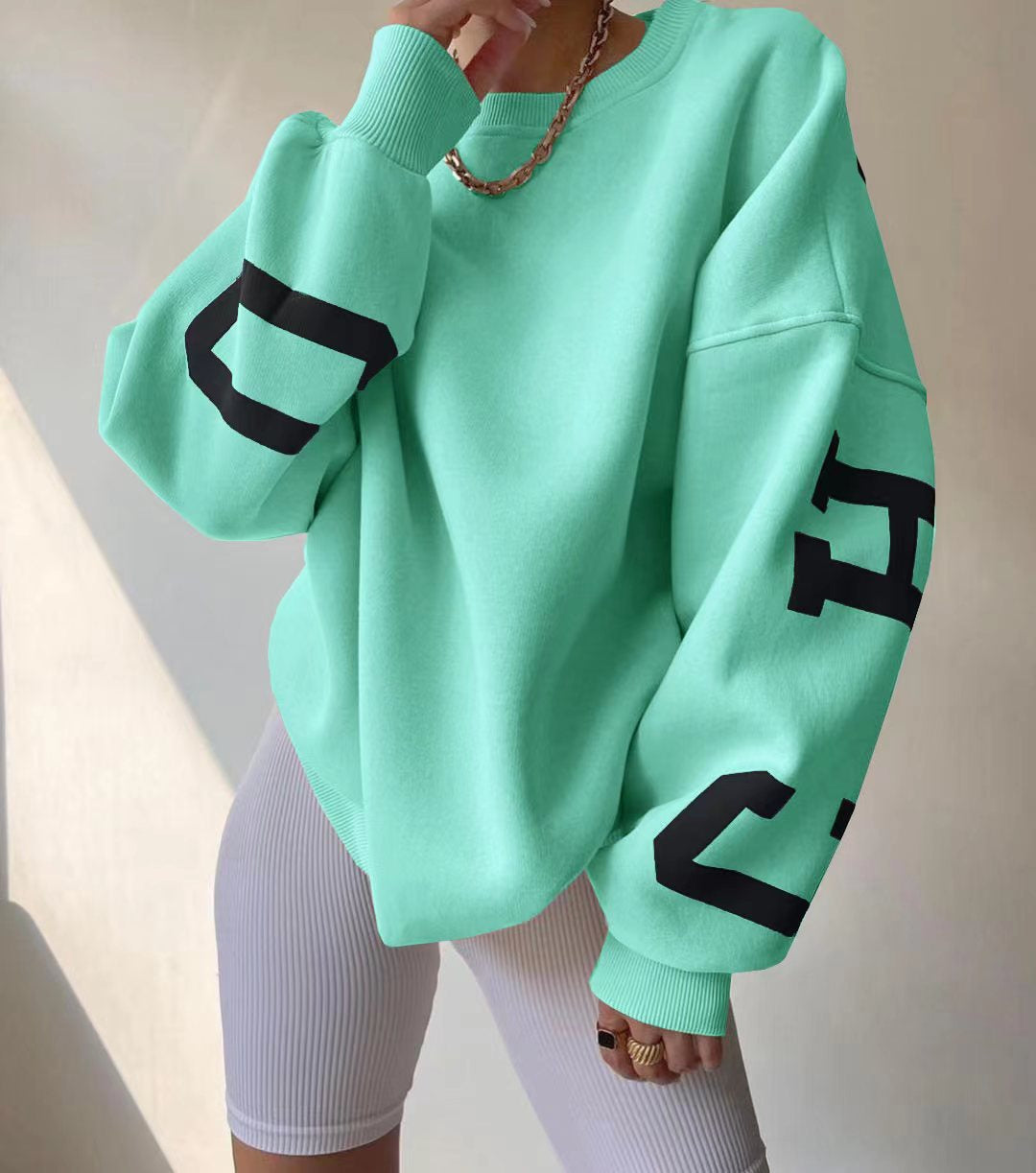 Oversized damestrui met letterprint Ronde hals