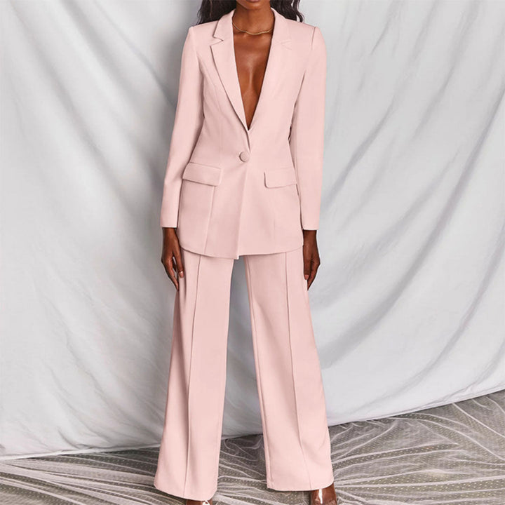 Damespakset in lichtroze met getailleerde blazer
