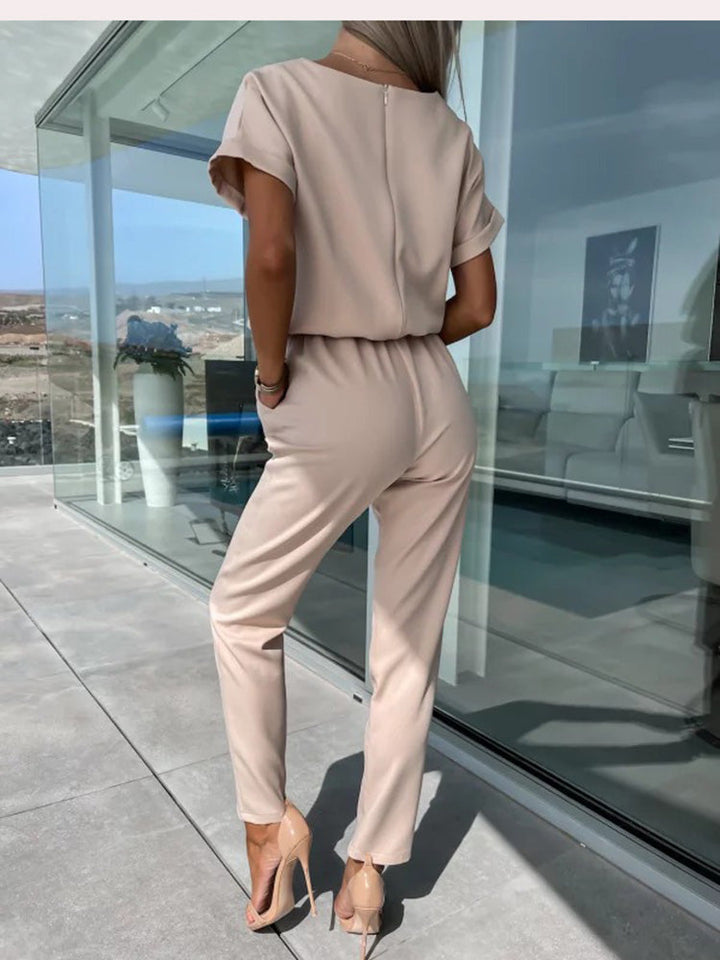 Dames jumpsuit in beige achteraanzicht