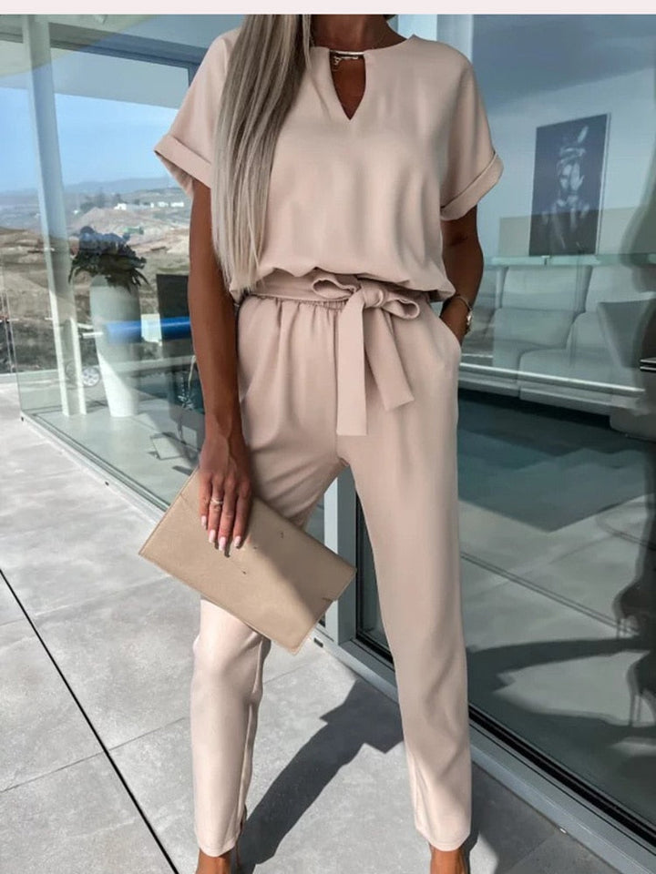 Dames jumpsuit in beige vooraanzicht