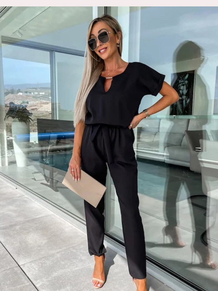 Dames jumpsuit in zwart met korte mouwen
