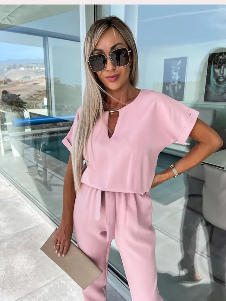 Dames jumpsuit in roze met V-hals