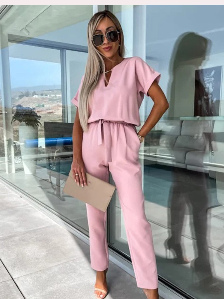 Dames jumpsuit in roze met korte mouwen