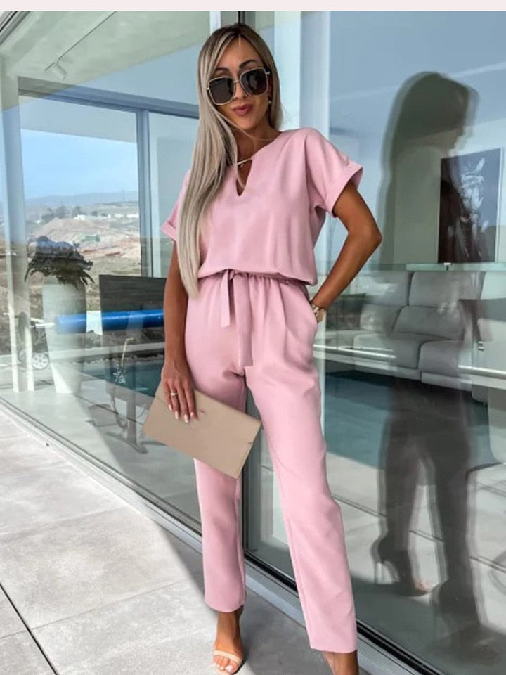 Dames jumpsuit in roze met korte mouwen