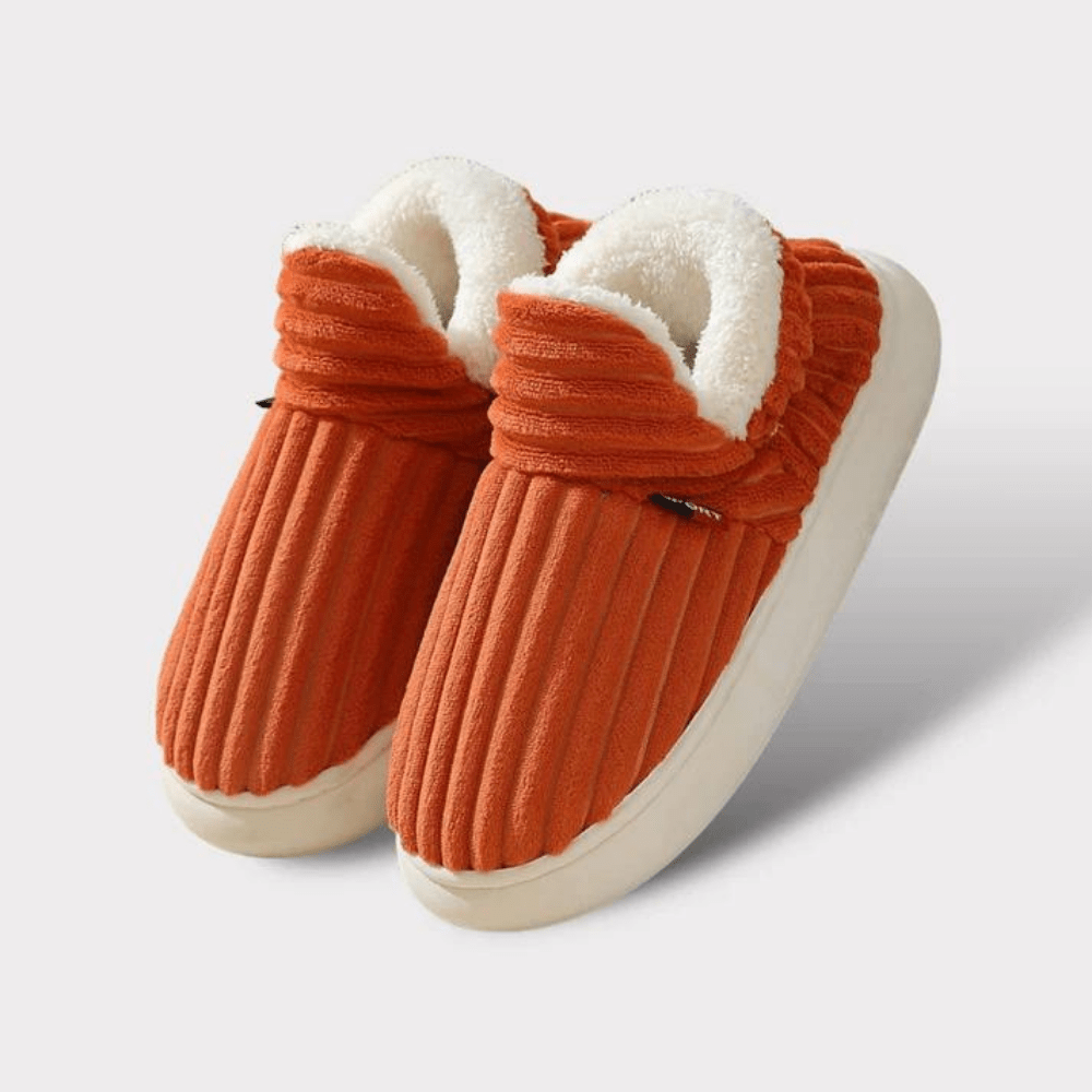 Oranje pantoffels van opzij met dikke zool