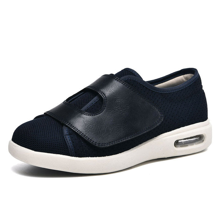 Brede klittenbandschoen in donkerblauw met luchtzool