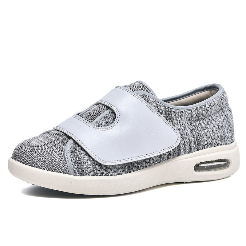 Brede klittenbandschoen in grijs met witte flap en luchtzool