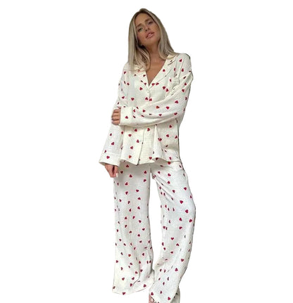 Dames pyjamaset met hartjesprint en losvallend silhouet Modehuis-Nederland