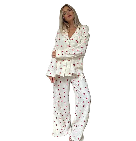 Dames pyjamaset met hartjesprint en losvallend silhouet Modehuis-Nederland