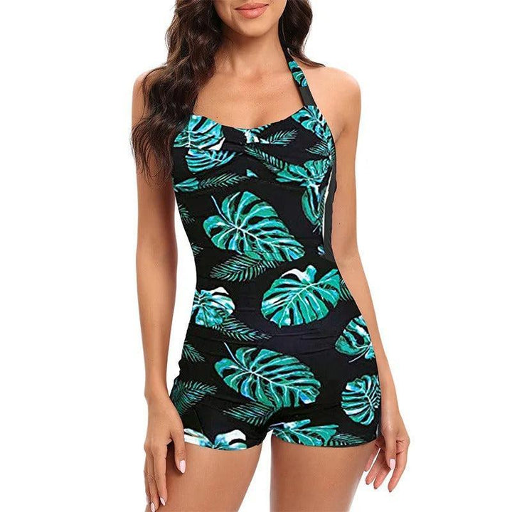 Dames Retro Halterbadpak Met Korte Pijpjes En Drapering in Zwart/Groen met bladerprint