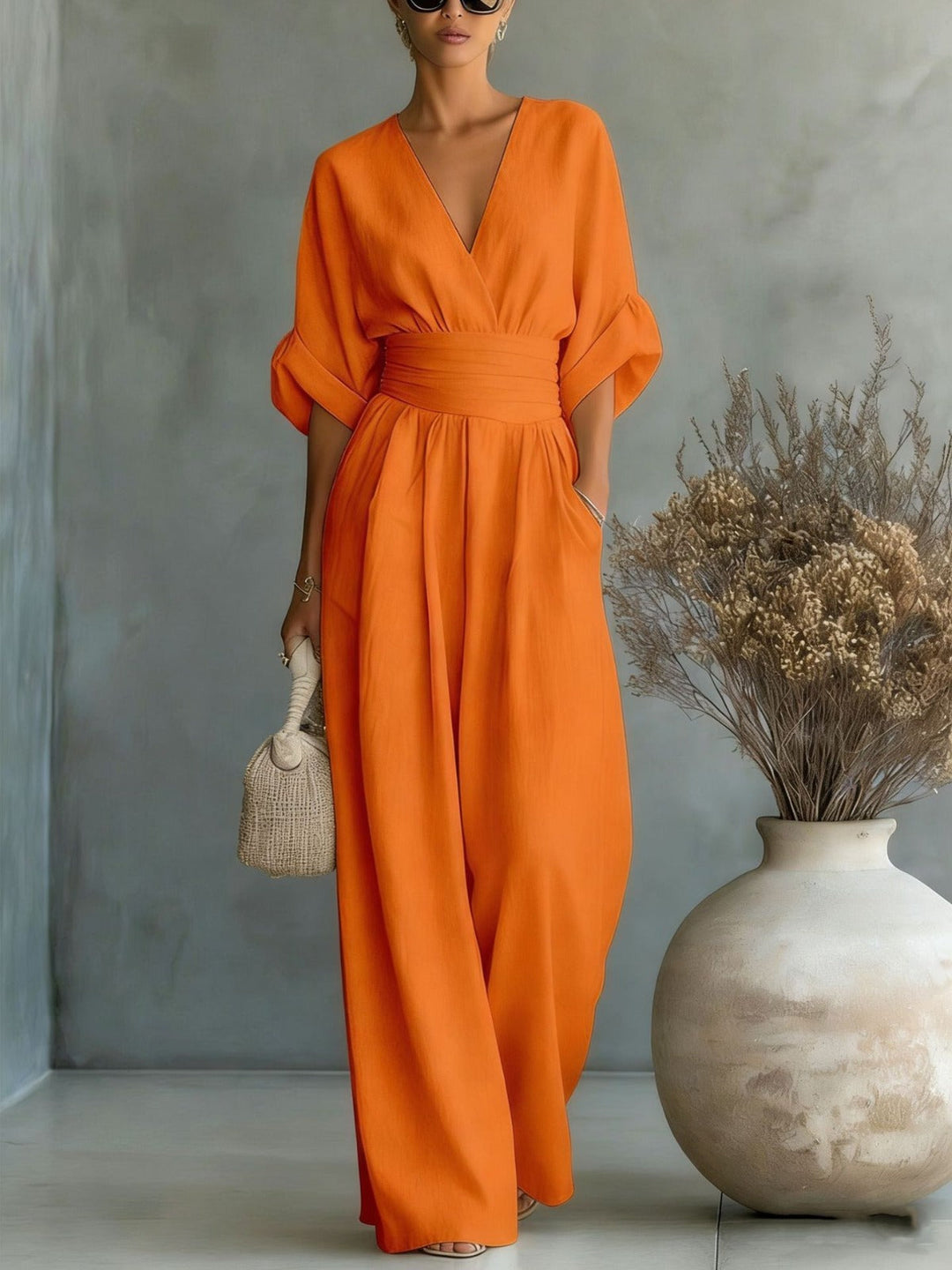 Dames jumpsuit met V-hals en wijde pijpen - afbeelding 4